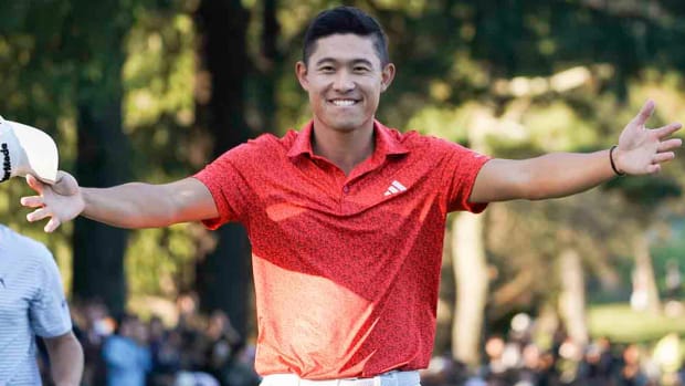 Collin Morikawa gestures to his wife Katherine Zhu, not pictured, after winning the PGA Tour Zozo Championship at the Narashino Country Club in Inzai on the outskirts of Tokyo, Sunday, Oct. 22, 2023.